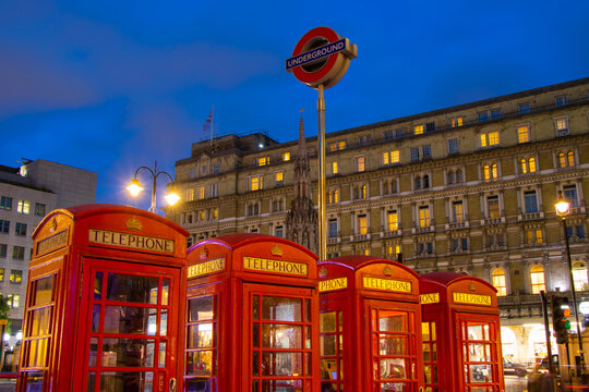 Red Telephone Boxes at Charing Cross Station in London, the UK