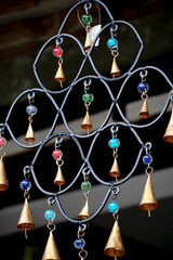 handmade decoration, hanging bells on a rope - 668243054