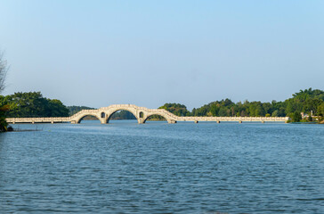 Stone arch bridge on the lake，Beautiful Longshui Lake Wetland Park, Chongqing, China