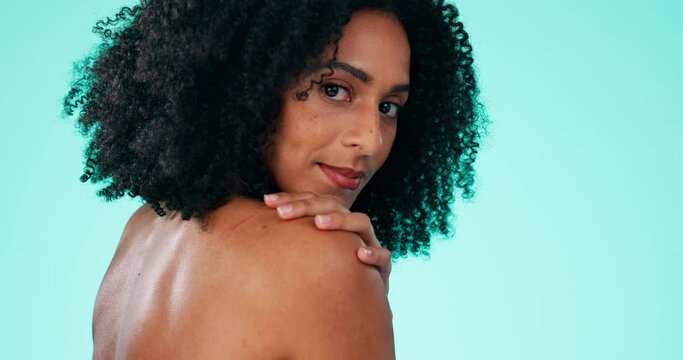 Skincare, shoulder and face of a black woman with beauty, wellness and spa aesthetic. Isolated, studio background and female model portrait feeling cosmetic care and glow from dermatology treatment