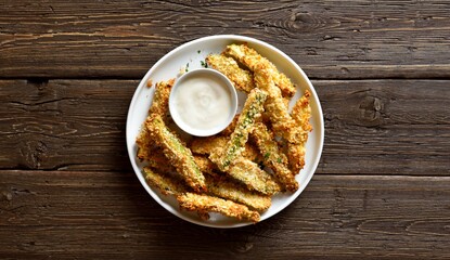 Crunchy zucchini breaded sticks with dip sauce
