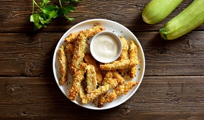Crunchy zucchini breaded sticks with dip sauce