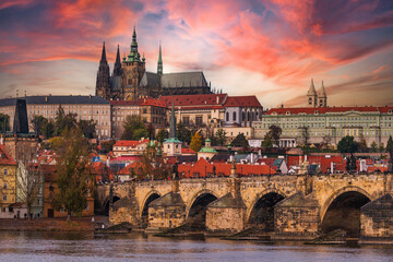 Amazing sunset sky with Hradcin and Charles Bridge over Vltava river in Prague, Czech Republic.