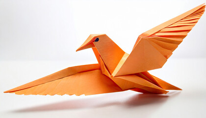 orange paper dove origami isolated on a white background