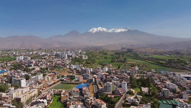 Aerial view of Arequipa , district of Cayma, with the Chachani volcano on the background