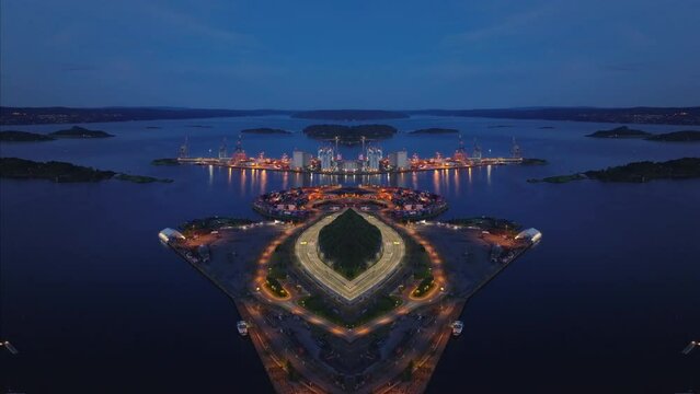 Aerial view of illuminated port and islands along coast at dusk. Abstract computer effect digital composed footage