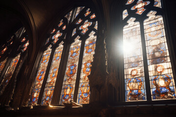 Aged Cathedral's Sun-Drenched Stained Glass