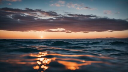 Obraz premium sunset over the ocean deep blue sea texture