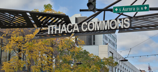 ithaca commons sign at entrance to public pedestrian path downtown (finger lakes upstate new york)...