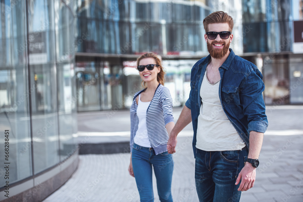 Sticker couple walking in city