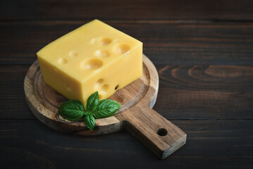 Cheese with holes large and small