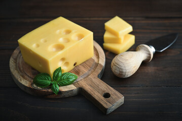 Cheese with holes large and small
