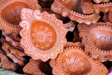Traditional Colorful Diwali diya or clay lamp for sale at Pune, India market in Diwali festival.