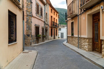 Beautiful empty street in the old town of Catamarruch, Alicante (Spain). - obrazy, fototapety, plakaty
