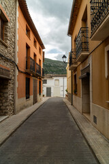 Fototapeta na wymiar Beautiful empty street in the old town of Catamarruch, Alicante (Spain).