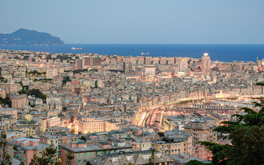 Naklejka premium Aerial view of Genoa at dusk