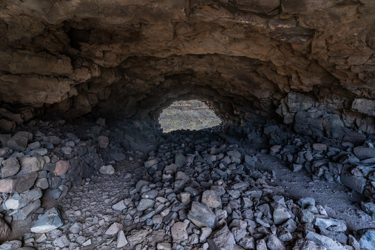 Archaeological complex "La Fortaleza", Santa Luc&radic;&ne;a De Tirajana, on the island of Gran Canaria, Spain. Cave where thes lived that crosses the mountain with access to a ravine