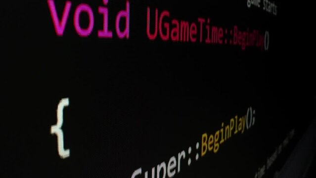 Closeup macro shot movement of coding script moving across LED screen with real-time AI-generated typing, showcasing advanced AI learning in optimization, debug and coding for software development.