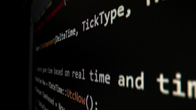 Closeup macro shot movement of coding script moving across LED screen with real-time AI-generated typing, showcasing advanced AI learning in optimization, debug and coding for software development.