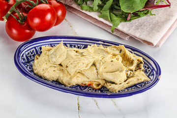 Creamy hummus in the bowl