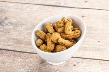 Raw ripe unpeeled peanut heap