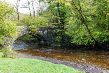 
The car park and bridge at Pont-Melin-Fach, the starting point of the walk to Sgwd Ddwli Uchaf waterfall, Wales, UK.  Shot on 