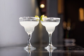 Colorful cocktail drinks with fruits and liquor  