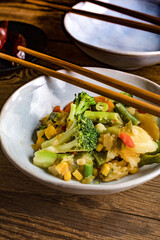 Stewed vegetables in ceramic bowls.