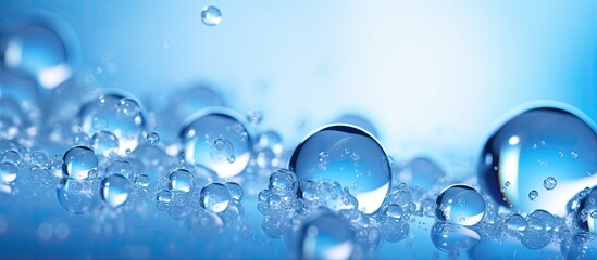 Macroscopic view of levitating transparent blue gas bubbles with defocus bokeh blur representing invigorating cleanliness and vitality