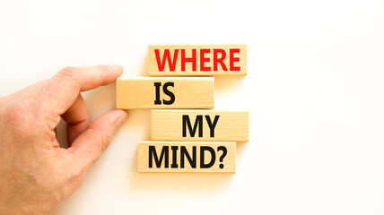 Where is my mind symbol. Concept words Where is my mind on wooden block. Beautiful white table white background. Businessman hand. Business, motivational and where is my mind concept. Copy space.