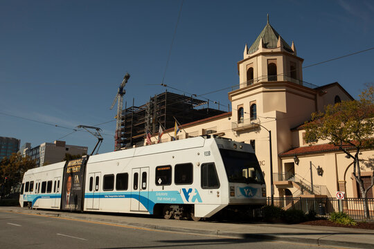 San Jose, California, USA - November 17, 2021: Afternoon sunlight shines on a VTA Valley Transportation Authority light rail train.