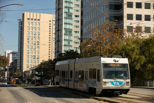 San Jose, California, USA - November 17, 2021: Afternoon sunlight shines on a VTA Valley Transportation Authority light rail train.