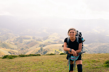 Fototapeta na wymiar girl Hiker on countryside landscape in the Pyrenees, Pyrenees in France.