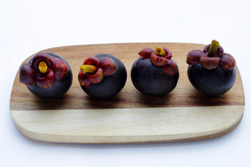 Fresh mangosteen fruit on white background.