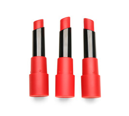 Obraz premium Beautiful red lipsticks on white background