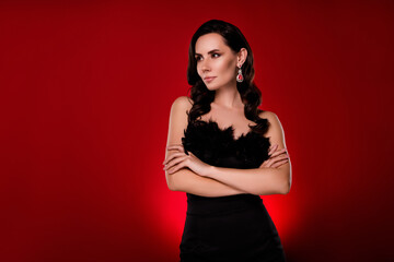 Photo of confident serious lady wear sexy outfit hands crossed looking empty space isolated dark...