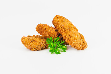 Breaded Chicken Inner Fillet, Chicken Breaded Raw Meat. Fast cooking.Breaded Chicken nuggets Fillet with salad on a White Background,food at home. Fast homemade food.Chicken breaded schnitzels.