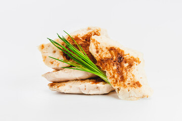 Chicken fillets fried until half cooked, semi-finished product with fresh herbs on a white background. Fast cooking.Fast homemade food.Fast food. Quick cooking at home. Copy space.