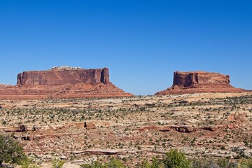 Canyonlands National Park offers breathtaking views of eroded canyons, rocky mesas and strange buttes in the area where the Green River and Colorado River meet in their canyons far below