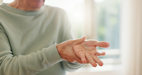 Senior person, hands and wrist with pain, injury and orthopedic wound at home. Closeup, elderly and...