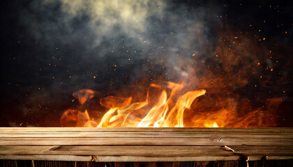 wooden table with fire burning at the edge of the table fire particles sparks and smoke in the air with fire flames on a dark background to display products