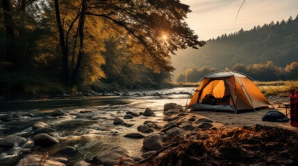 Peaceful tent pitched perfectly beside a gently flowing river
