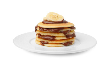 Stack of tasty pancakes with chocolate spread and banana slices isolated on white