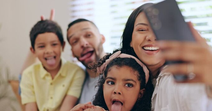 Happy family, funny face or father take a selfie with kids on sofa to relax on social media together for memory. Love, tongue out or dad taking picture or photograph with children siblings in home