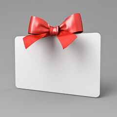 Blank white gift card signboard or gift voucher mock up stand with red ribbon bow isolated on dark grey background with shadow minimal concepts 3D rendering