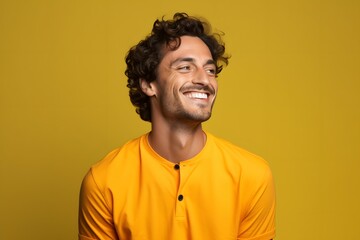 Obraz premium portrait of a happy man on a yellow background