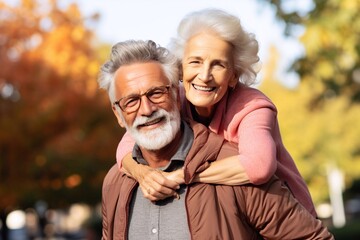 Fototapeta premium A image of Portrait of a happy senior couple walking in the park in autumn Generative AI
