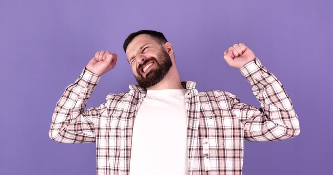 Man sipping and wakes up over purple background.