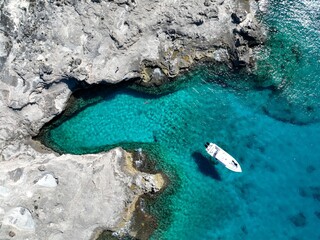 The famous swimming hole off the shoreline of West Caicos. A secluded beach and crystal clear waters