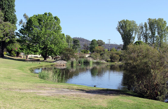 View of Quart Pot Creek with water, trees and grass in Stanthorpe in Queensland, Australia